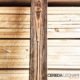 Dettaglio di perline in legno spazzolate e rusticate
